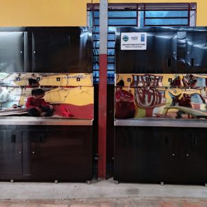 Side-by-side installation of two commercial smart drinking water filtration stations in a school facility.